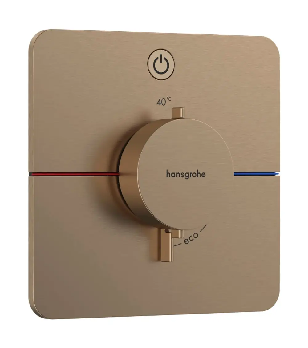 Thermostat zur Regulierung der Wassertemperatur, montiert auf einer goldbronzenen Platte. Hansgrohe-Logo und Bedienelemente für Temperatur und Eco-Modus sind sichtbar.